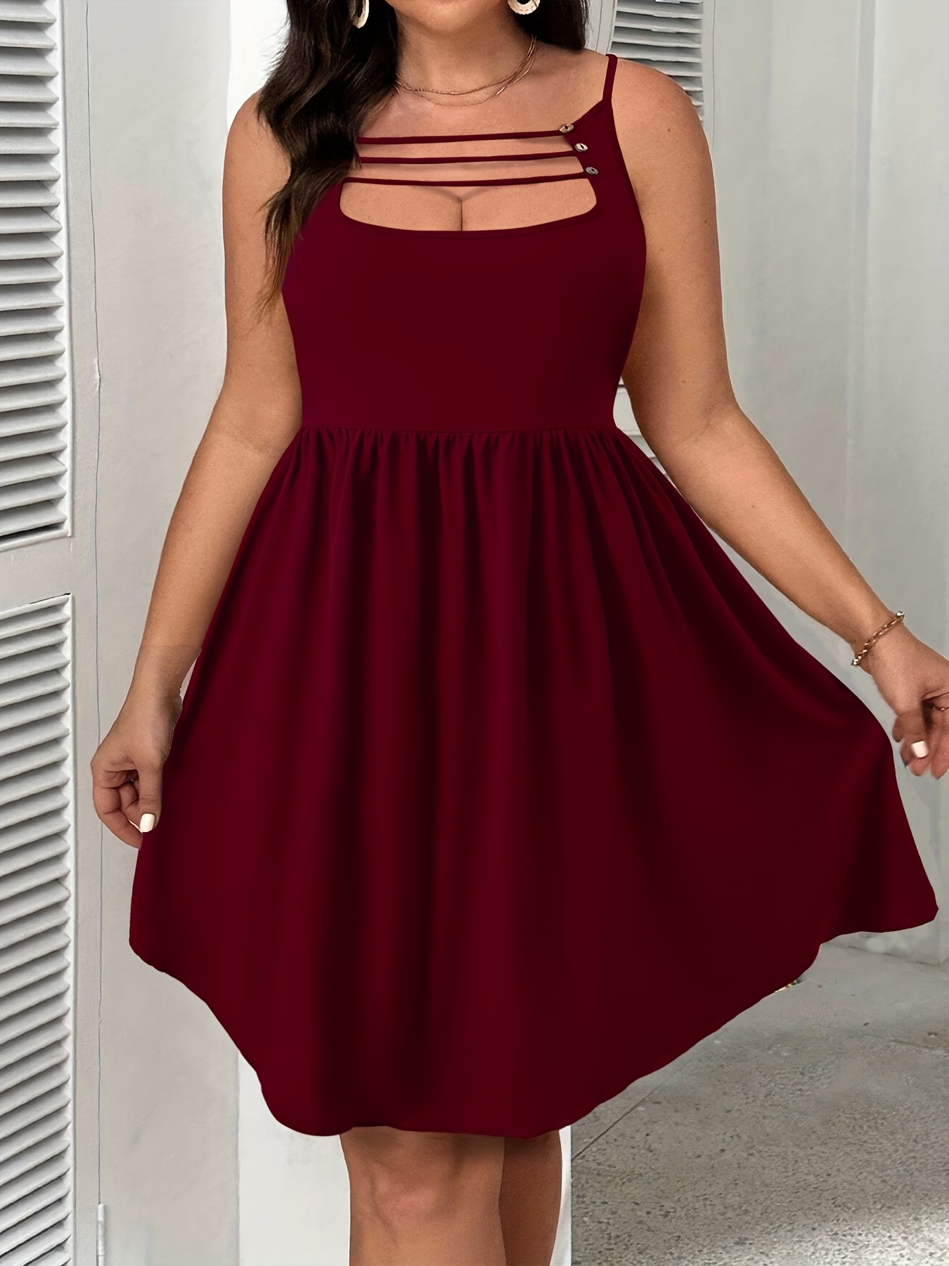 Robe extensible à bretelles spaghetti & ample au niveau des hanches