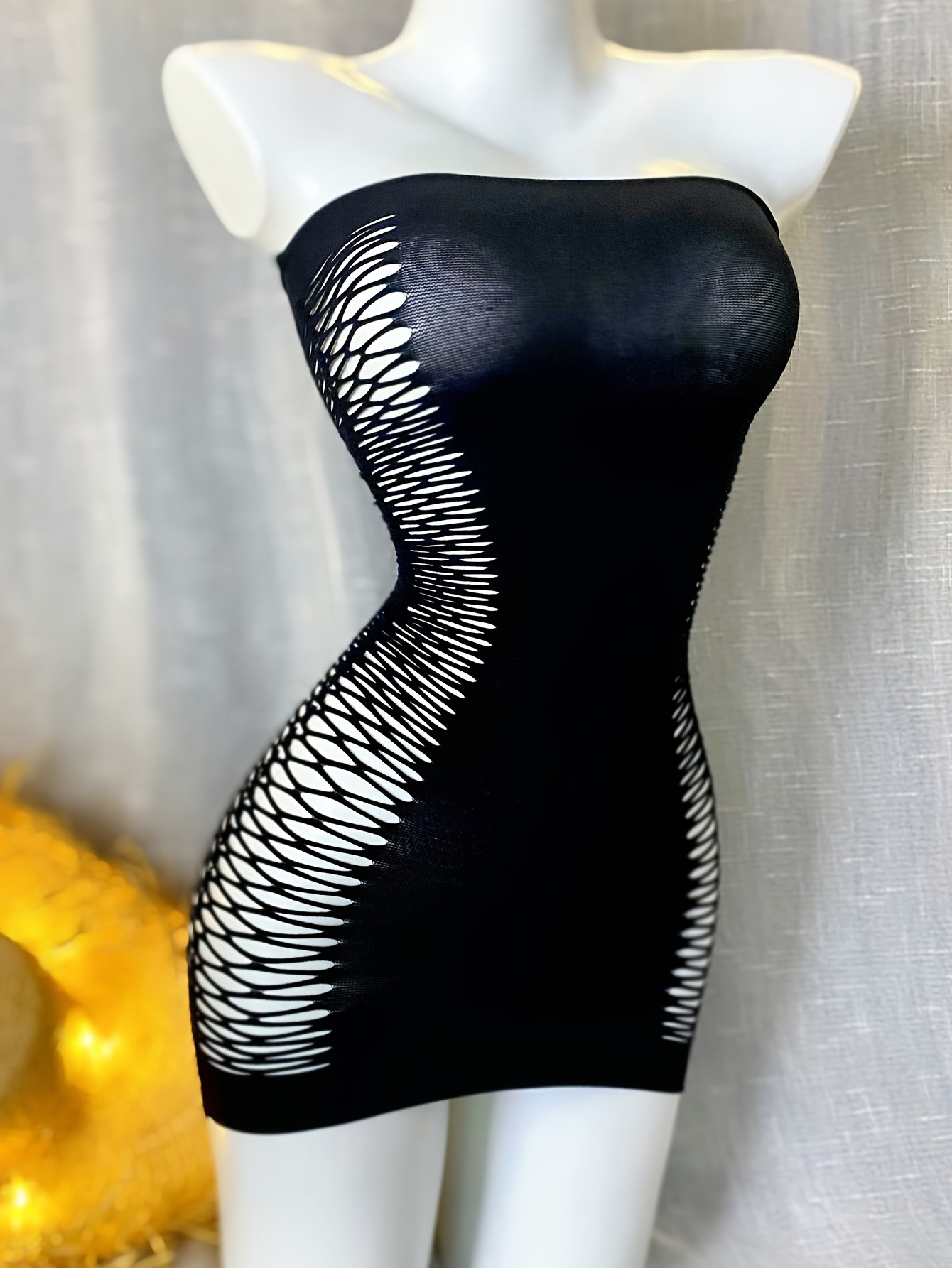 Robe moulante sexy extensible sans manches à col rond tissu tricoté