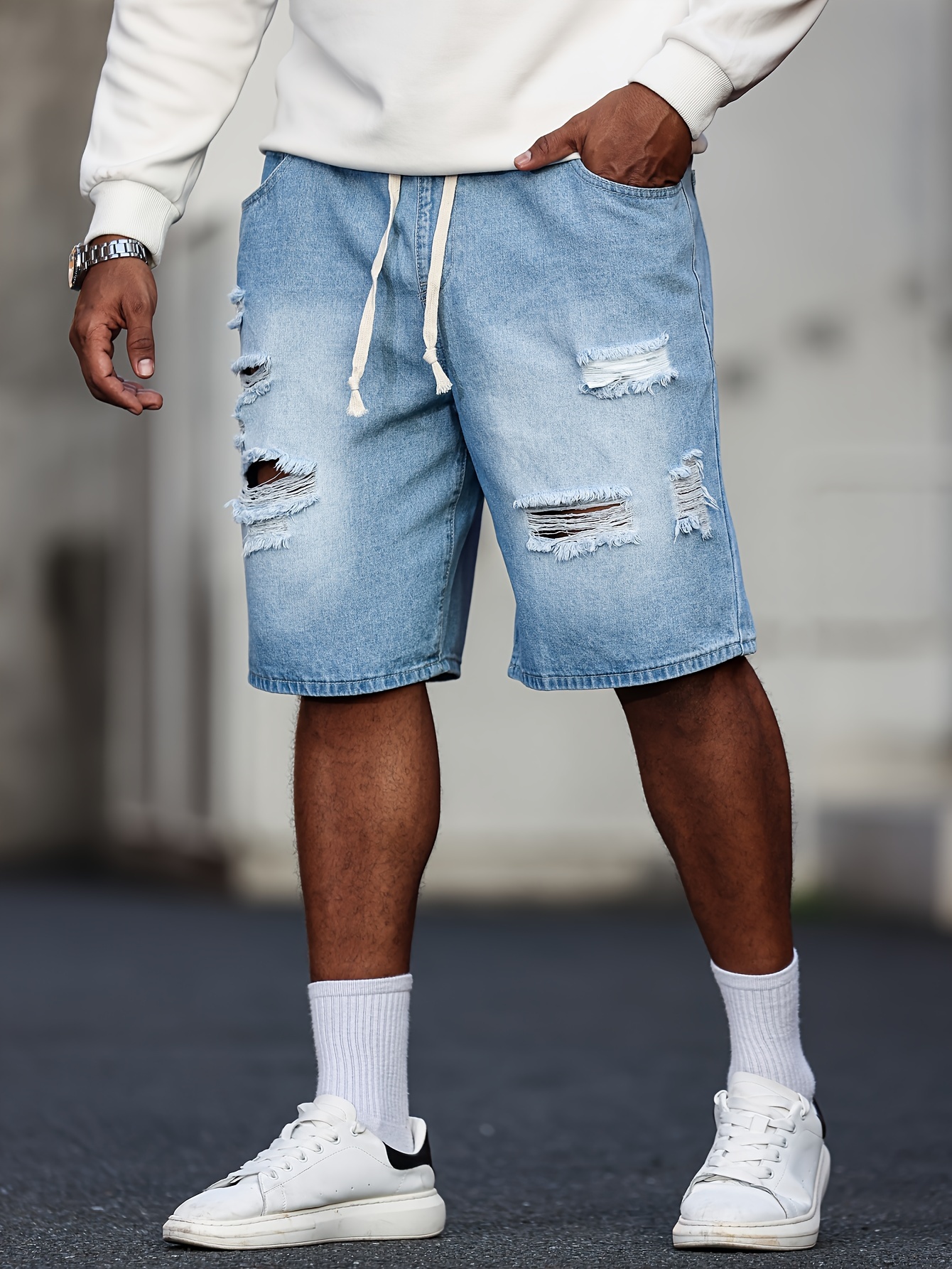 Baggy short en dénim déchirés avec cordon