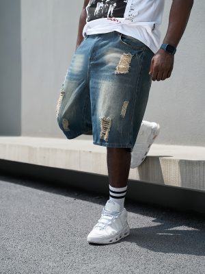 Baggy short en denim délavé avec trous