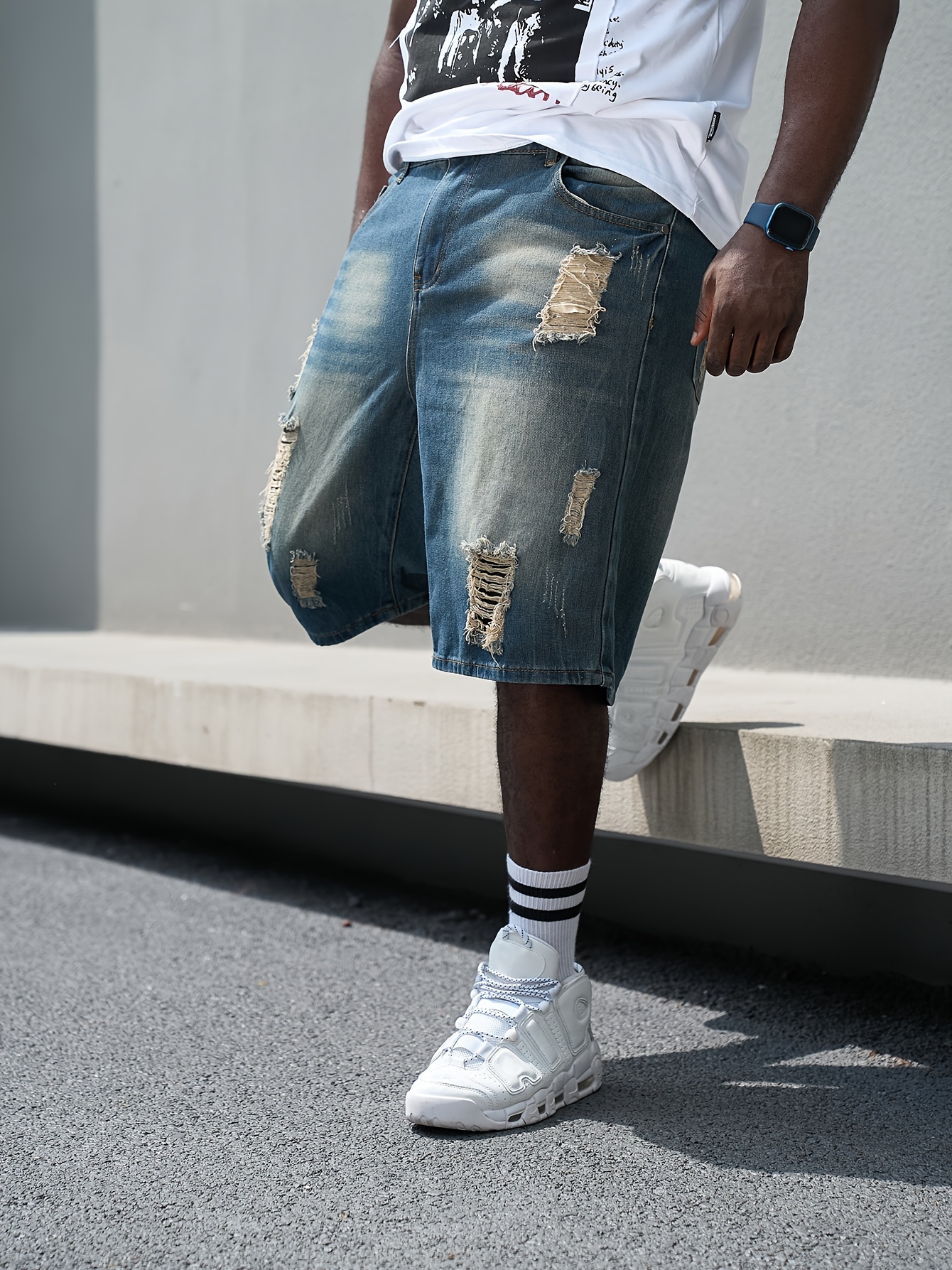 Baggy short en denim délavé avec trous