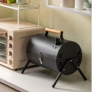 Barbecue à charbon portable en fonte avec poignée en bois
